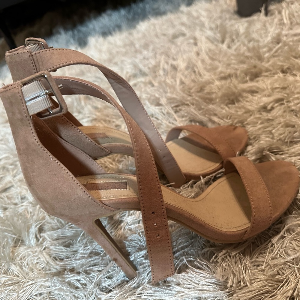 pinkish nude heels size 7. worn twice